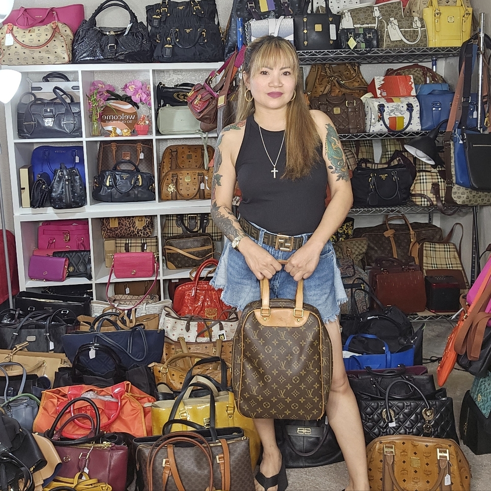 Louis Vuitton Monogram Excursion M41450 Handbag